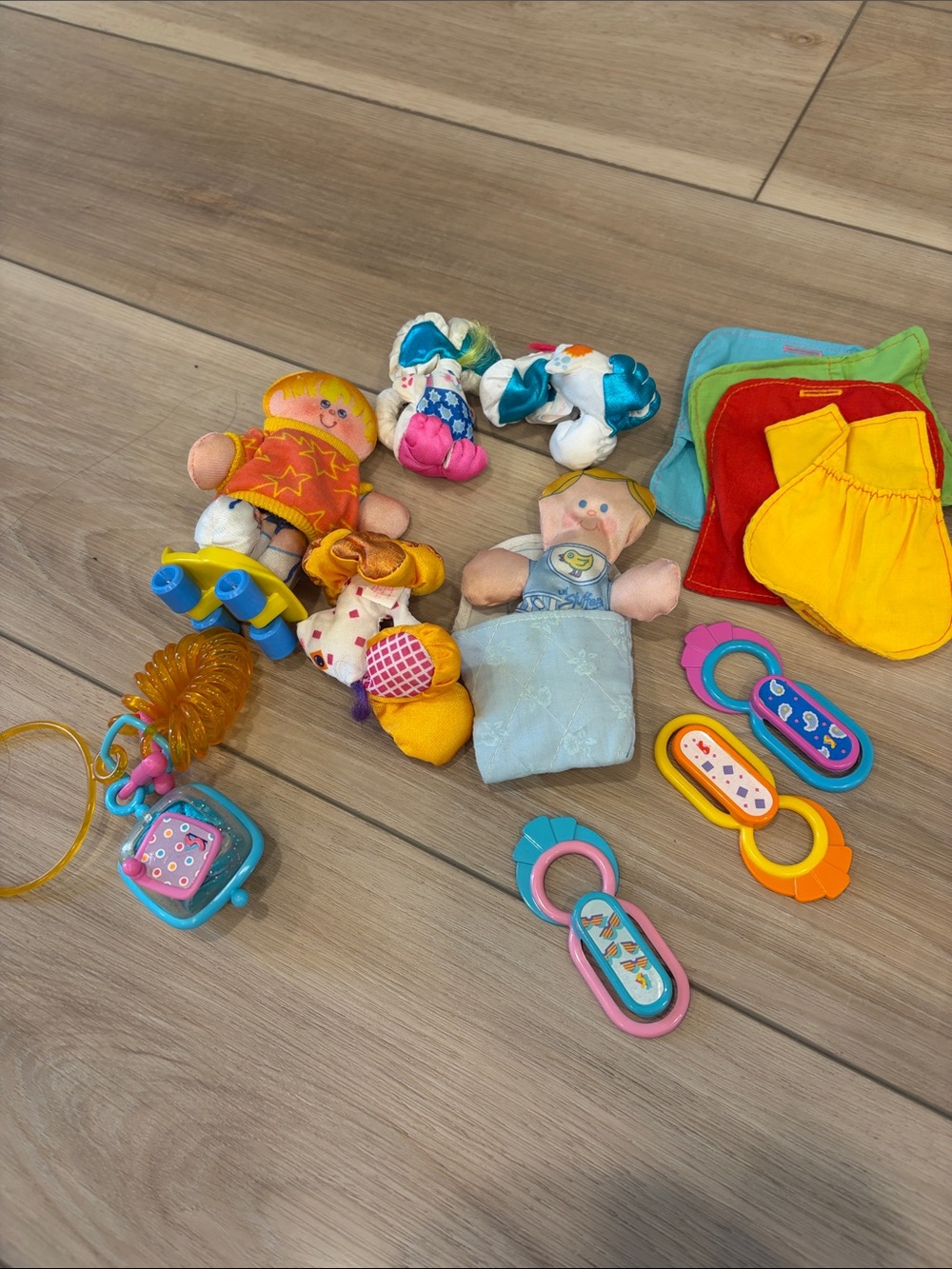 Vintage Fisher-Price Smooshees Colorful Plush Baby Toy Set in Yellow, Blue, Pink